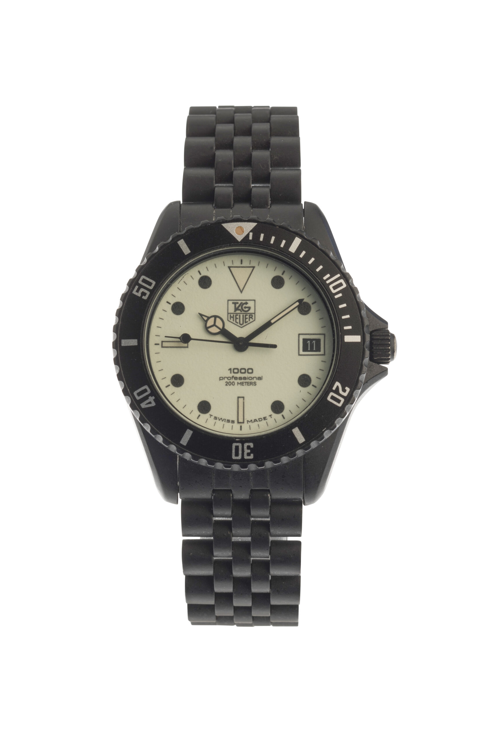 TAG Heuer Professional / Night-Dive — Образец семейства 980.031 с поздним логотипом TAG Heuer 1000; не точный экранный экземпляр.